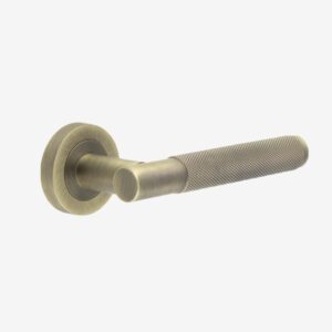 Antique Brass Knurled Lever Door Handle On Rose